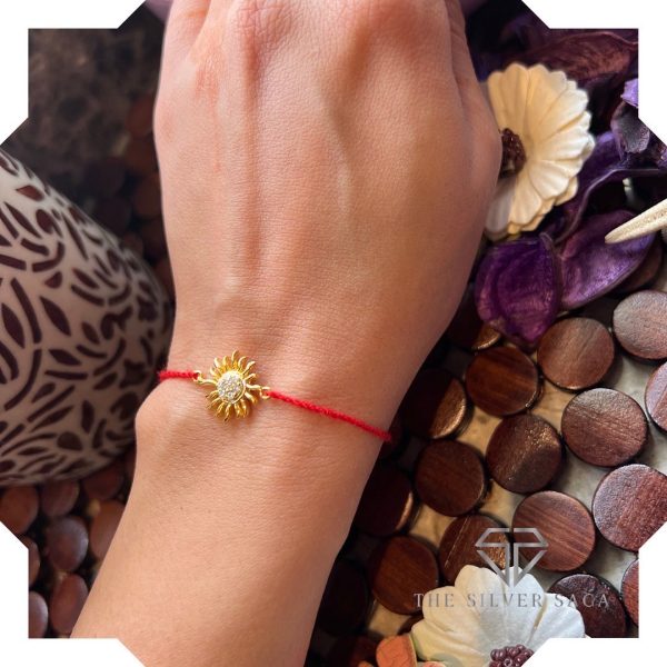 Silver Sun Rakhi in gold polish , moli rakhi