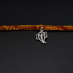 Silver ganesh bansuri Rakhi in moli